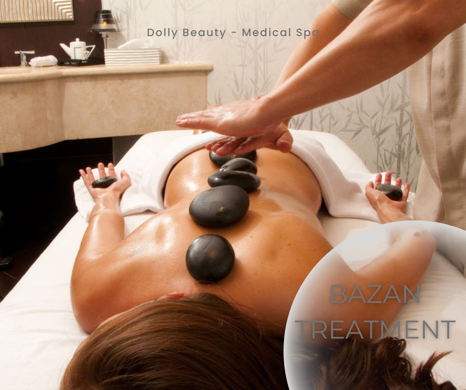 Đá bazan nóng đặt dọc cột sống lưng trong liệu trình massage thư giãn